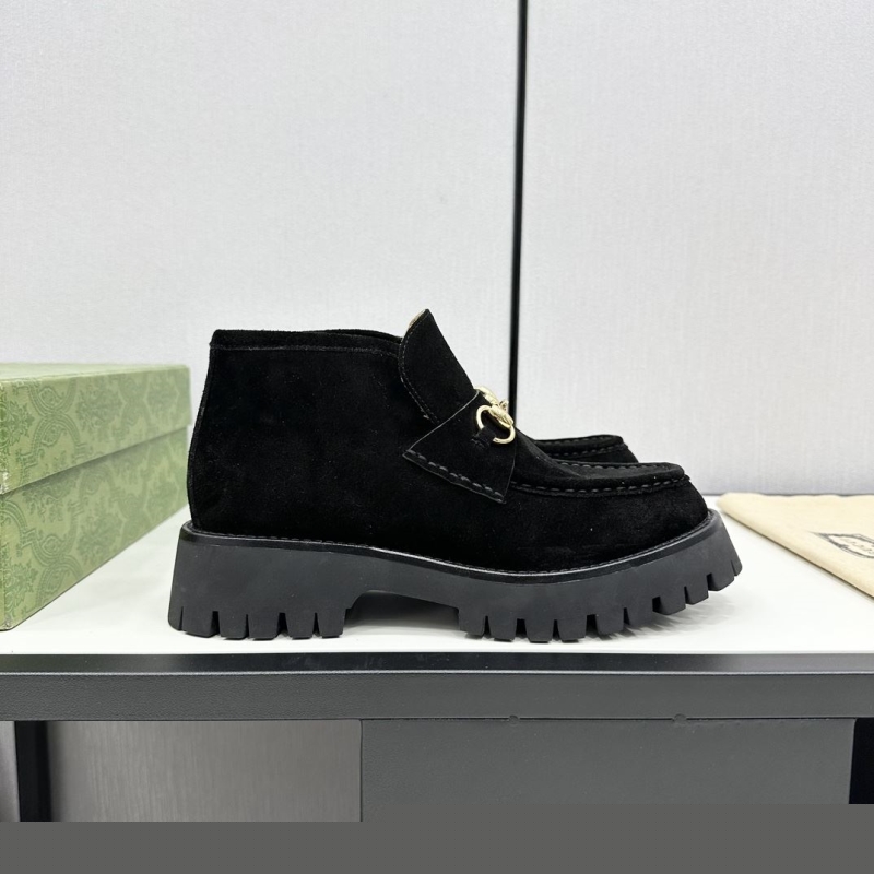 G*u*i boots